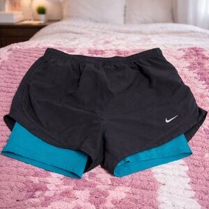 Nike Women's Black shorts with teal spandex